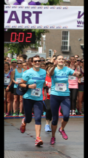 Niamh Delaney and her mother crossing the finish line