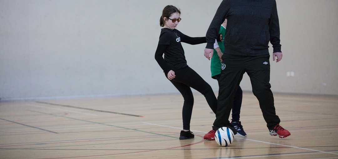 Image of Annie playing blind football