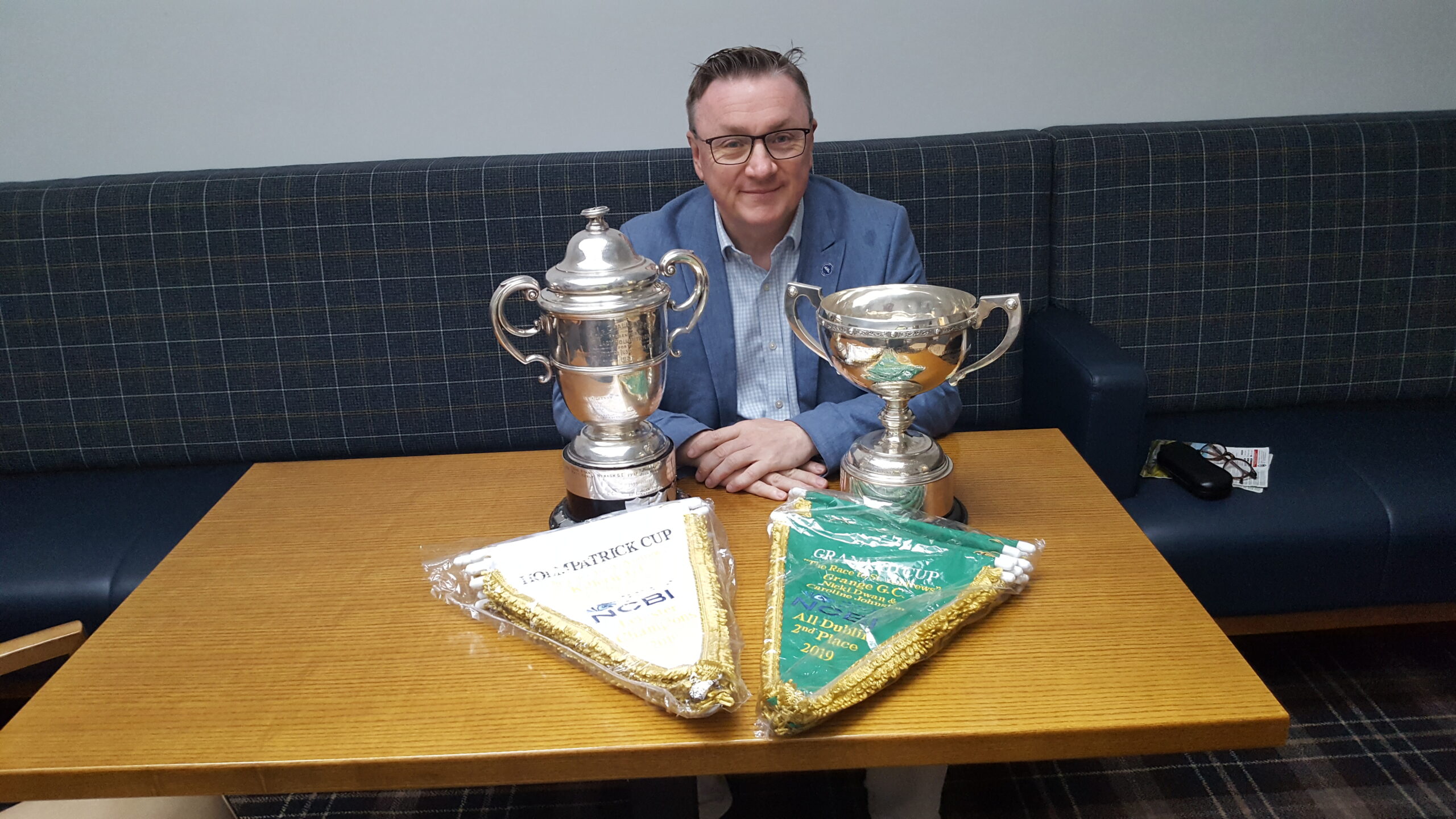 Ceo Chris White and the two Golf Cups
