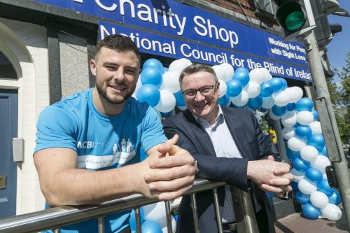 Robbie Henshaw and Chris White CEO of Vision Ireland, At official opening of the Rathmines Shop