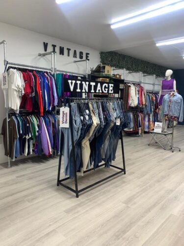 This image shows the various rail of vintage clothing within Vision Ireland stores including denim classics and more.