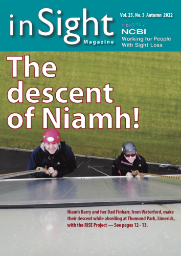 The front cover of inSight Magazine shows a picture of Niamh Barry and her dad Finbarr hanging off the the side of Thomond Park in Limerick. The pair were abseiling as part of the RISE Project family fun day. The Thomond Park pitch is visible below them. The title inserted above their heads reads The descent of Niamh.