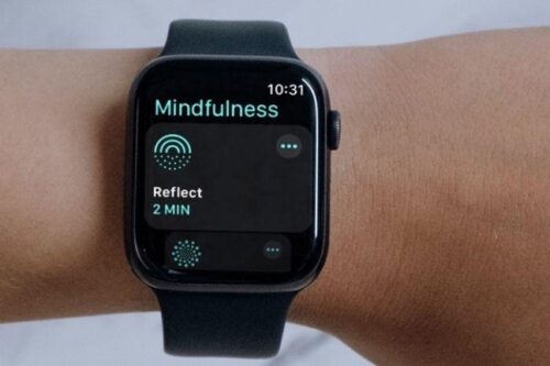 Apple watch on person's wrist displaying the Mindfulness app open